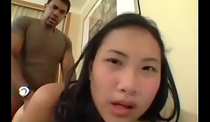 Young Thai girl Nat gets pumped full of African semen