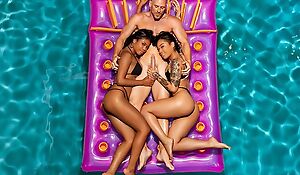 Two exotic beauties share bald-headed guy in FFM threesome