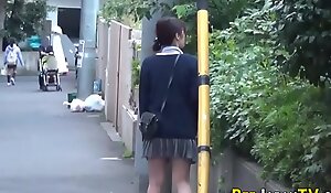 Asian babe pees frankly