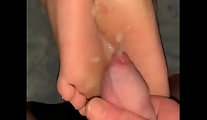 Cum on her feet