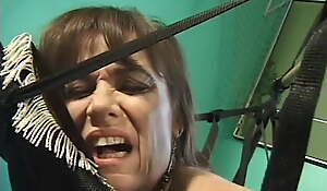 Slutty brunette enjoys a young shaft helter-skelter her muff on a stool