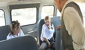 Two naughty schoolgirls deep-throat the bus driver's stiff cock with the backseat